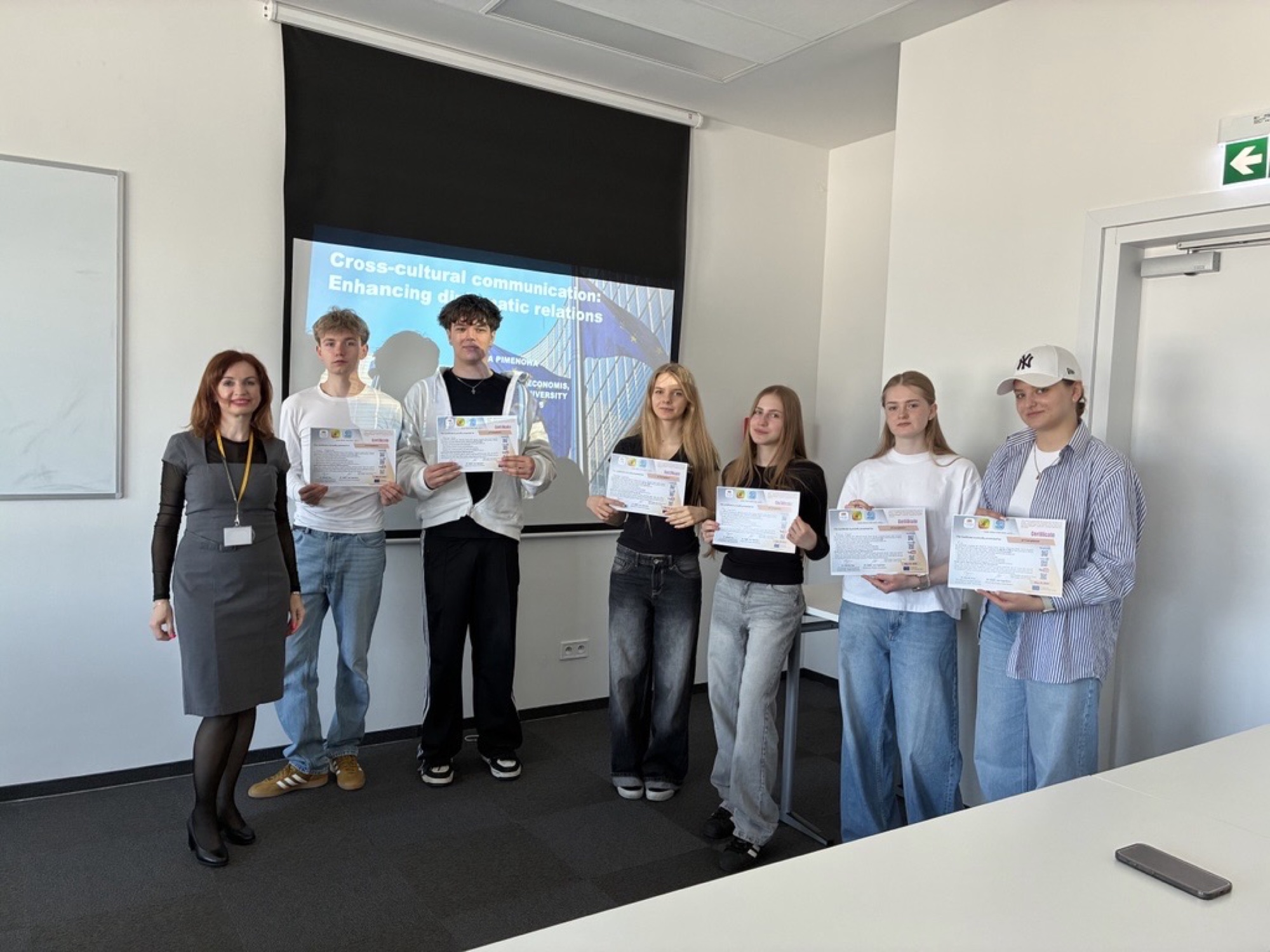 Participants receiving certificates at the Summer School closing session